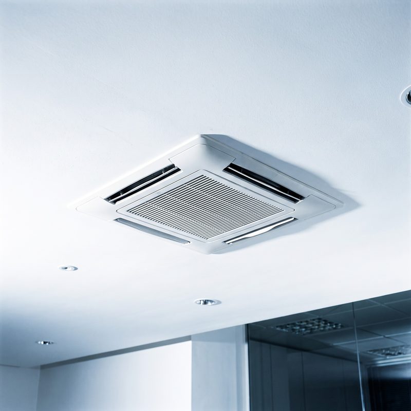 Four-way ceiling cassette AC in an office false ceiling